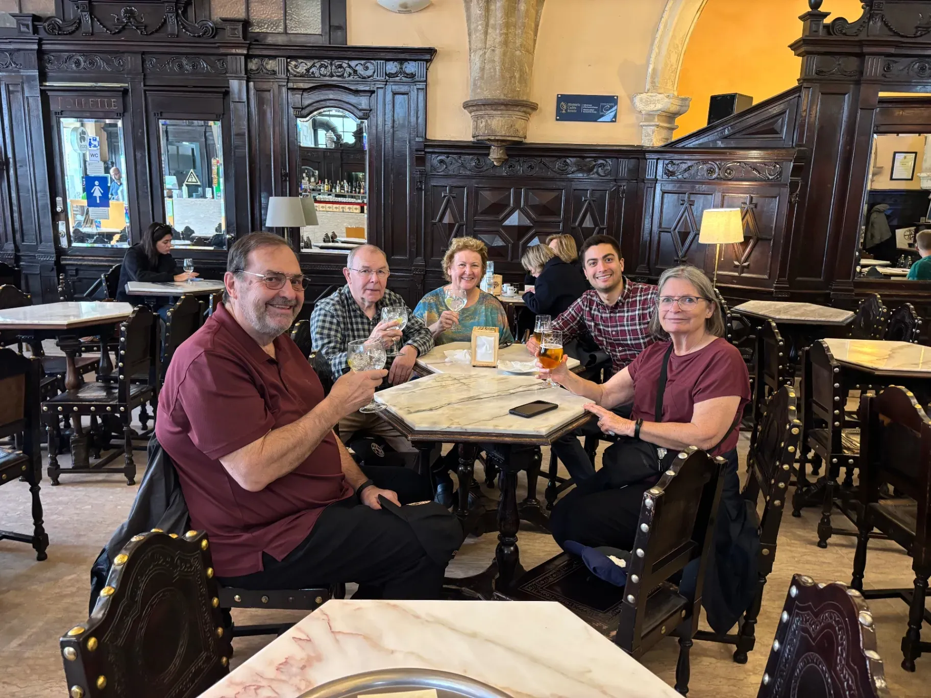 Mateus and guests enjoying a local café break during a Coimbra tour